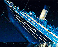 The lights on the Titanic go out as the boat sinks into a darkened ocean.